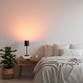 LED Sunset Lamp projecting warm orange and pink gradient light onto a wall